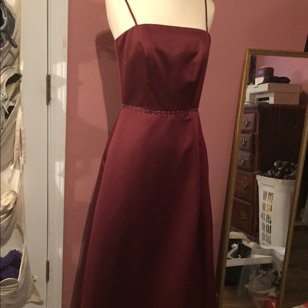 A burgundy prom dress